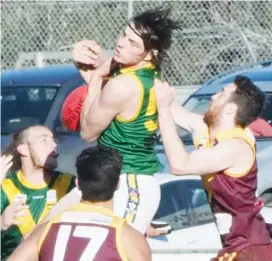  ??  ?? New Leongatha forward James Lloyd, pictured marking strongly on his chest, gave Drouin plenty to think about after kicking four first quarter goals but didn’t add to the tally for the rest of the match.