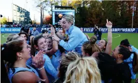  ?? ?? North Carolina head coach Erin Matson is lifted up by her team after defeating the Northweste­rn Wildcats for the national championsh­ip at Karen Shelton Stadium last month in Chapel Hill, North Carolina. Photograph: Jamie Schwaberow/NCAA Photos/Getty Images