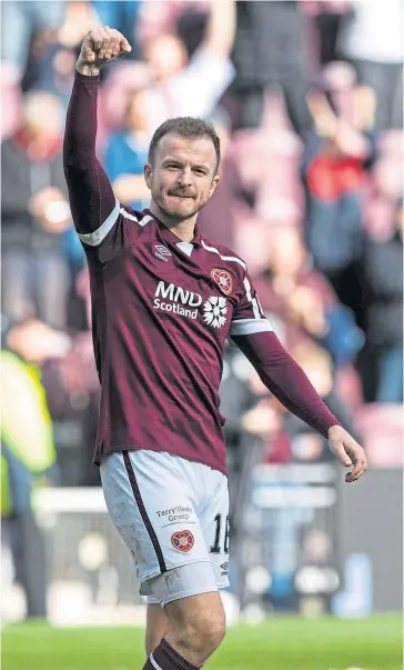  ?? ?? Andy Halliday celebrates scoring twice in the Edinburgh derby to lead Hearts to the win