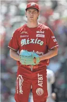  ?? ALFREDO ESTRELLA/AFP VIA GETTY IMAGES ?? Trevor Bauer pitched for the Diablos Rojos in an exhibition game March 24 against the New York Yankees.