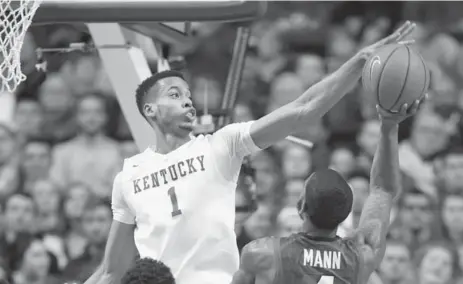  ?? ANDY LYONS/GETTY IMAGES FILE PHOTO ?? Kentucky big man Skal Labissiere slid to No. 28 in the NBA draft despite the hype from coach John Calipari; teammate Tyler Ulis fell out of the first round.