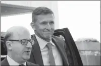  ?? The Associated Press ?? FEDERAL COURTHOUSE: Former President Donald Trump national security adviser Michael Flynn, right, arrives at federal courthouse in Washington on July 10 for status hearing.