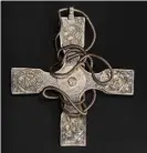  ??  ?? A millennium’s worth of dirt has been removed from the Anglo-Saxon cross buried in the 9th century. Photograph: National Museums Scotland