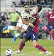  ?? MARCIO JOSE SANCHEZ – THE ASSOCIATED PRESS ?? LAFC forward Diego Rossi, left, collides with Dallas FC defender Bressan during their June 23 match.