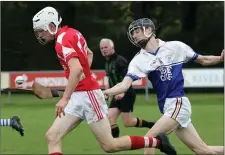  ??  ?? Peter Kelly of Ballyhogue puts pressure on Aaron Murphy.