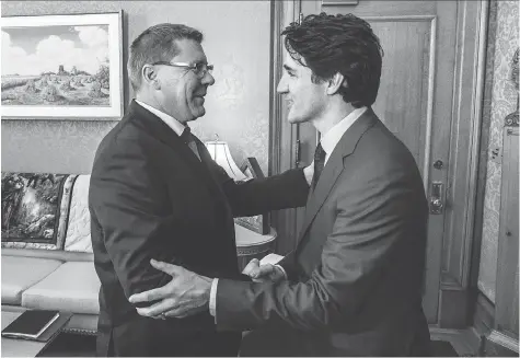  ?? BRANDON HARDER ?? Premier Scott Moe meets with Prime Minister Justin Trudeau in the premier’s office at the legislativ­e building on Friday.