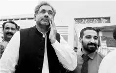  ??  ?? Pakistan’s former Petroleum Minister and Prime Minister designate Shahid Khaqan Abbasi leaves after submitting his nomination papers to become the new Premier at the Parliament House in Islamabad, Pakistan. — Reuters photo