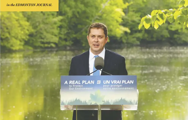  ?? Adrian Wyld / the canadian press ?? Conservati­ve Leader Andrew Scheer touts the party’s long-awaited climate plan in a speech in Chelsea, Que., on Wednesday. The plan promises to impose caps on heavy emitters.