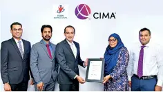  ??  ?? Zahara Ansary, Country Manager - CIMA Sri Lanka with Dilshad Jiffry - Managing Director - Icon Business School at the signing ceremony. Also in the picture are Rakitha Jayatunge - Director IBS, Dasun Mendis - Director IBS and Sivasubram­aniam Vithushan – Manager Markets - CIMA SL