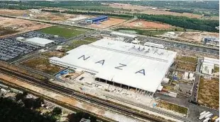  ??  ?? Naza’s manufactur­ing hub in Gurun. SM Nasarudin says 60,000 units of the Peugeot T73 model will be produced over a five-year period.