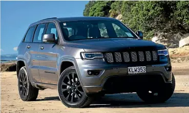  ??  ?? Blackhawk package adds, well, black to a Grand Cherokee Laredo. And 20-inch alloys.