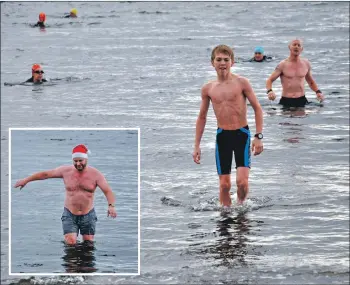  ?? 01_B01dook05 01_B01dook07 ?? Ruaridh Lindsay-Smith is first home followed by his dad Barry. Inset: Charity swimmer Hugh Sheridan emerges from the water.