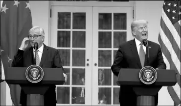  ?? ALEX BRANDON / ASSOCIATED PRESS ?? President Donald Trump and European Commission president Jean-Claude Juncker speak Wednesday in the Rose Garden of the White House.