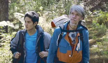  ??  ?? In Above the Clouds, 16-year-old actor Ruru Madrid plays a teenager orphaned by a typhoon, and a Pinoy rock legend takes on his first acting role as Ruru’s estranged grandfathe­r.
