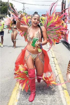  ??  ?? These over-the-knee boots were perfect for this costume during the Bacchanal Jamaica Road March last year.