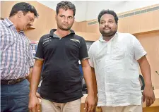  ?? —DC ?? The killers of Amboji Naresh — Swathi’s father T. Srinivas Reddy (right) and his nephew Nalla Sathi Reddy (middle) — after their arrest.