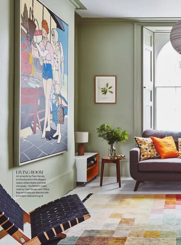  ??  ?? LIVING ROOM
An artwork by Paul Harvey is a focal point in this elegant space where styles and eras mix easily – the MG501 Cuba chair by Carl Hansen and 1950s Ikea armchairs are teamed with a modern sofa and rug