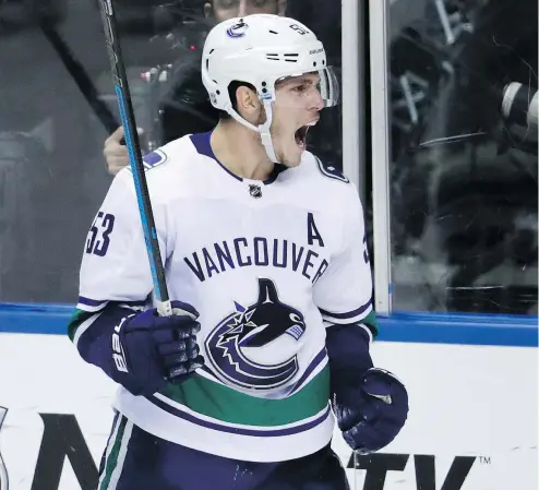  ?? —APPHOTO ?? Vancouver Canucks centre Bo Horvat celebrates after scoring against the Panthers Saturday in Florida.