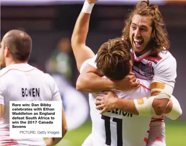  ?? PICTURE: Getty Images ?? Rare win: Dan Bibby celebrates with Ethan Waddleton as England defeat South Africa to win the 2017 Canada Sevens