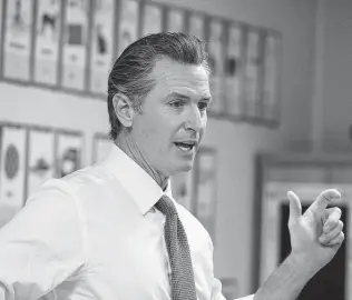  ?? Mel Melcon / Tribune News Service ?? California Gov. Gavin Newsom announces plans to seek a bounty hunter law similar to Texas’ SB 8, except instead of abortion, his would allow citizen lawsuits over assault weapons.