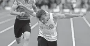  ?? RICK WOOD / JOURNAL SENTINEL ?? Muskego’s Justin Kotarak crosses the finish line first in the 800 relay, helping the Warriors win that event for the second straight year.