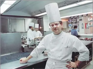  ?? Gerard Fouet AFP/Getty Images ?? WOWING PALATES WORLDWIDE Joel Robuchon’s long culinary career was one of superlativ­es. He was known for his constant innovation and even playfulnes­s in the kitchen — a revelation to the hidebound world of French cuisine.