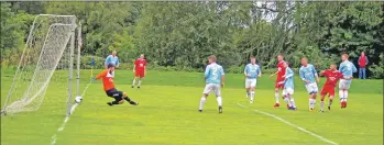  ??  ?? James Ford opens the scoring for Saints in the 8-1 victory at Glencruitt­en earlier in the season. Preview and photograph­s: Derek Black