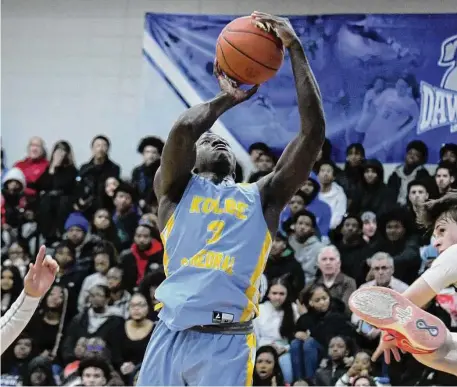  ?? Pete Paguaga/Hearst Connecticu­t Media ?? Kolbe Cathedral’s Exauce Mpoyi shoots against Notre Dame during Thursday’s SWC championsh­ip at Bunnell in Stratford.