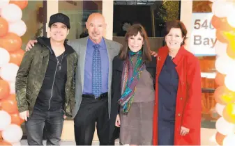  ?? Nancy and Stephen Grand Family House 2015 ?? Train lead singer Pat Monahan (left), Stephen and Nancy Grand, and Family House CEO Alexandra Morgan at the groundbrea­king of the Nancy and Stephen Grand Family House in 2015.