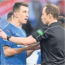  ??  ?? Referee Willie Collum sends off Ryan Jack on Sunday.