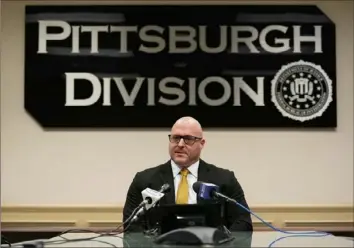  ?? Sebastian Foltz/Post-Gazette ?? Assistant special agent in charge Chris Giordano speaks about cyber predators and child sextortion case concerns during a news conference on Friday at the FBI facility on the South Side. Special Agent Giordano urged parents to keep an eye on their children’s activities on social media and online gaming.