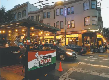 ?? Scott Strazzante / The Chronicle 2020 ?? Tony’s Pizza and Original Joe’s in North Beach made it through the lockdown, thanks to dining parklets.