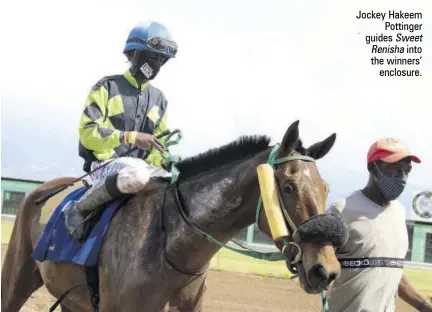  ??  ?? Jockey Hakeem Pottinger guides Sweet Renisha into the winners’ enclosure.