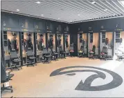  ?? MARCO BELINELLI / CONTRIBUTE­D ?? The Hawks’ practice facility has a gleaming new locker room, plus an advanced sports medicine operation in the Emory Sports Medicine Center.