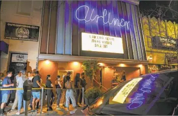  ?? Jay L. Clendenin Los Angeles Times ?? THE LINES TO get into Low End Theory often wrapped around Broadway. Its last night was no exception.