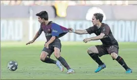  ?? FOTO: EFE ?? Halilovic, con el Milan en el partido de pretempora­da contra el Barça en Estados Unidos