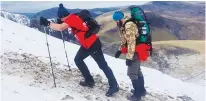  ??  ?? Gruelling: Ed Jackson climbing Mount Snowdon