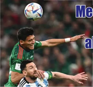  ?? AFP PHOTO ?? Mexico’s Hector Moreno (left) and Argentina’s Lionel Messi fight for the ball during the Qatar 2022 World Cup Group C football match at the Lusail Stadium in Lusail, Qatar on Saturday, Nov. 26, 2022.