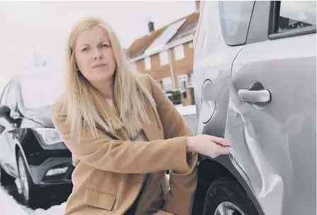  ??  ?? Laura Marriner with the damage to her Nissan Note, after a car hit her then drove off.