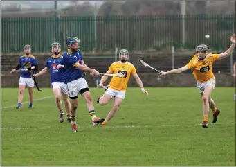  ??  ?? Wicklow’s Gary Byrne fires a low ball up the field in Pearse’s Park, Arklow.