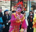  ?? PROVIDED TO CHINA DAILY ?? Right: A Yingge dancer draws a big crowd.