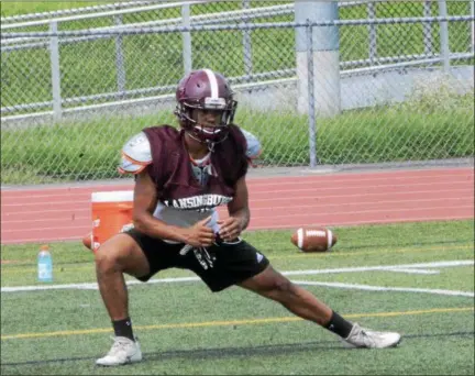  ?? PHOTO BY JOE BOYLE ?? Alonzo Barrett stretching before practice on at Lansingbur­gh High.