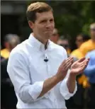  ?? Steve Mellon/Post-Gazette ?? Rep. Conor Lamb announces on the South Side on Friday that he will run for the Senate seat left vacant by GOP Sen. Pat Toomey. Saturday he moved on to Erie, the first stop on his campaign trail.