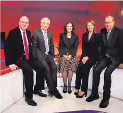  ??  ?? Theresa Villiers, the then Secretary of State for Northern Ireland, with UTV managing director Michael Wilson, presenters Paul Clark and Alison Fleming and political editor Ken Reid in the UTV LIve Studio in 2013