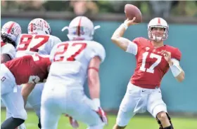  ?? John Todd / Stanford Athletics ?? Quarterbac­k Ryan Burns passes during Stanford’s Cardinal and White spring game. Burns went 10-for-15 passing, giving him a boost in the backup QB race.