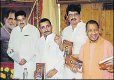  ?? SUBHANKAR CHAKRABORT­Y/HT PHOTO ?? Uttar Pradesh chief minister Yogi Adityanath at a book release function in Lucknow on Monday.