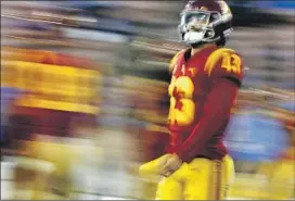  ?? Luis Sinco Los Angeles Times ?? CALEB WILLIAMS, warming up before facing UCLA on Saturday, needs to lead the Trojans to victories in their final two games to have a shot at the playoffs.