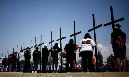  ?? Photograph: José Luis González/ Reuters ?? Activists take part in a tribute to the victims of the 3 August 2019 Walmart shooting in El Paso, Texas.