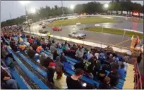  ?? JONATHAN TRESSLER — THE NEWS-HERALD ?? A view from the stands Sept. 2 during the grand opening of The Painesvill­e Speedway.