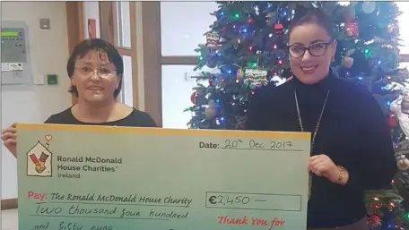  ??  ?? Aoife Anderson presents a cheque for €2,450 to the Ronald McDonald House in Crumlin Hospital following a Christmas concert she organised in the Castle Dargan Hotel on December 14th.